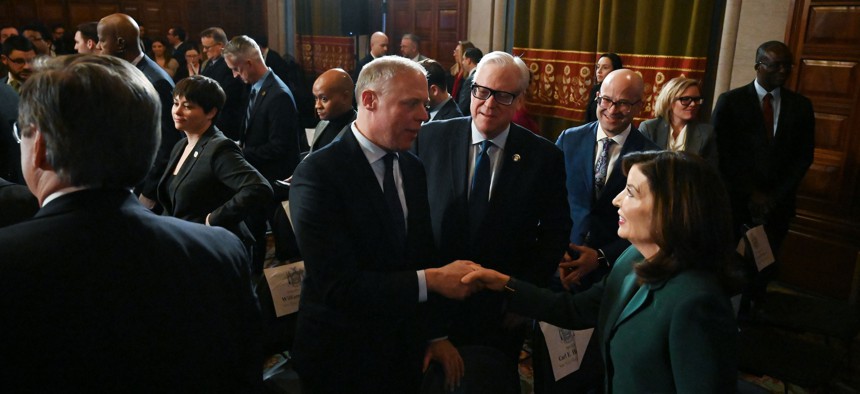 Assembly Minority Leader Will Barclay shakes hands with Gov. Kathy Hochul after her budget address in January.