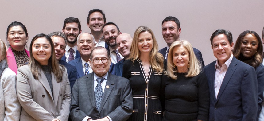 Alex Bores (third from left), Jerry Nadler (front), Carolyn Maloney (third from right) and many other politicians attend New York City Council Member Virginia Maloney's inauguration ceremony.