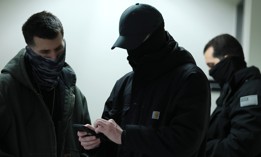 Masked federal agents patrol the halls of immigration court at the Jacob K. Javits Federal Building on Feb. 4, 2026 in New York City.
