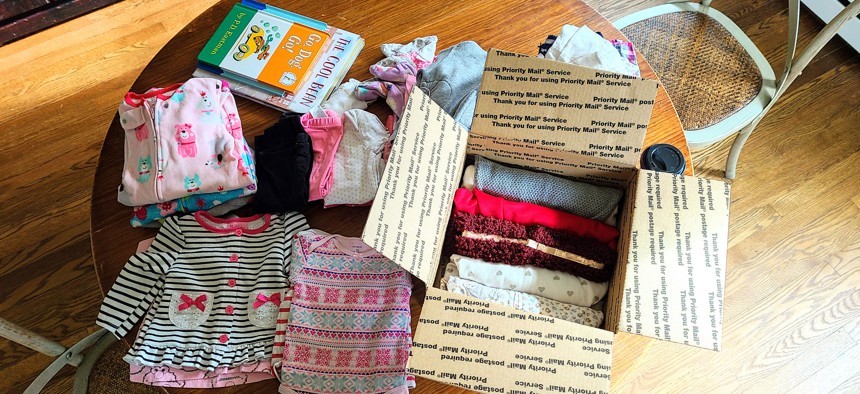 A clothing package for a family involved with New Neighbors Partnership.