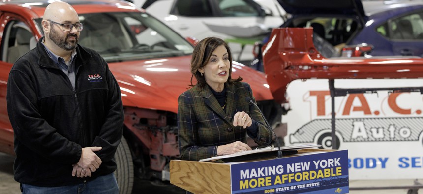 Gov. Kathy Hochul speaks about her proposals to reform car insurance at an auto body shop on Feb. 3, 2026.