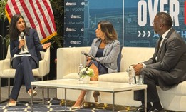 Insha Rahman, left, moderates a panel featuring former Kamala Harris 2024 Campaign Manager Julie Chavez Rodriguez and Chicago Mayor Brandon Johnson at the Democratic Mayors Association summit in Cleveland.