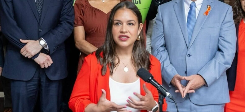 Assembly Member Emérita Torres speaks at a rally in the state Capitol.