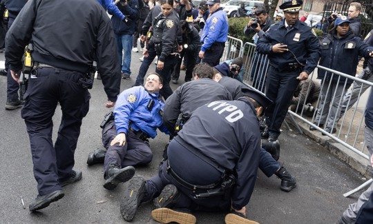 Police arrest a person suspected of throwing what looked like an explosive device near Gracie Mansion Saturday. There were no injuries.