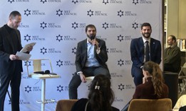 State Sen. Andrew Gounardes, center and Assembly Member Alex Bores, right, speak at a Met Council panel on artificial intelligence on March 8, 2026.