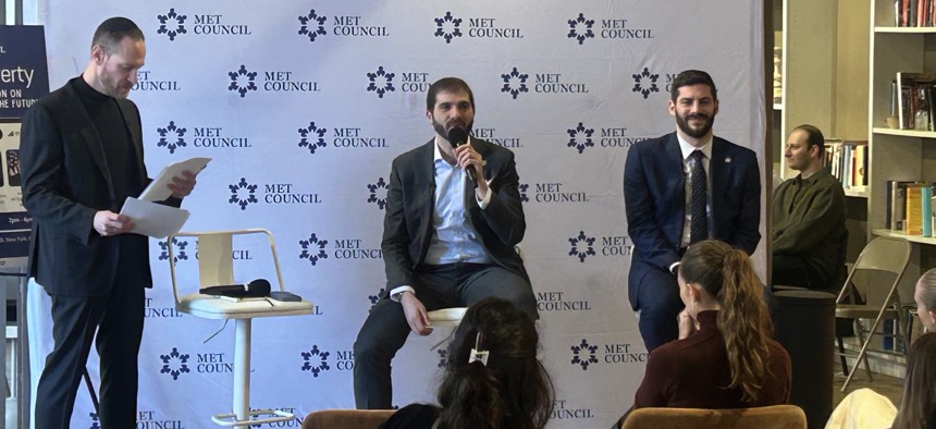 State Sen. Andrew Gounardes, center and Assembly Member Alex Bores, right, speak at a Met Council panel on artificial intelligence on March 8, 2026.