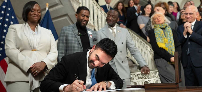 New York City Mayor Zohran Mamdani signs an executive order to create the Mayor’s Office of Community Safety on March 19, 2026.