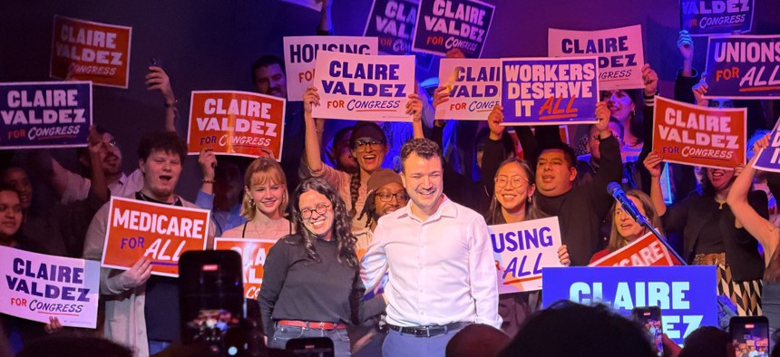 Assembly Member Claire Valdez, left, stands on stage with Mahmoud Khalil during her congressional campaign launch party on Jan. 9, 2026.