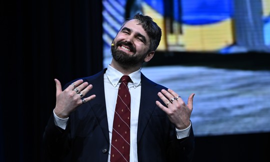 City & State's Jeff Coltin perfmed as Zohran Mamdani, singing about Free Buses to the tune of Tom Petty's Free Fallin'