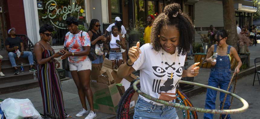 A hula hooper at a block party on June 20, 2021 in Bedford-Stuyvesant, Brooklyn, New York