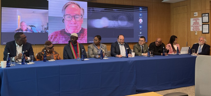 From left, Pastor Gilford Monrose, Jackie Rowe Adams, Sheikh Musa Drammeh, Pastor Tashyra Ayers, Menashe Shapiro, Peter Koo, Shams DaBaron, Kayla Mamelak Altus and Randy Mastro