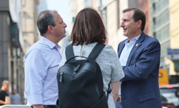 Brad Lander speaks with Rep. Dan Goldman outside 26 Federal Plaza in August.