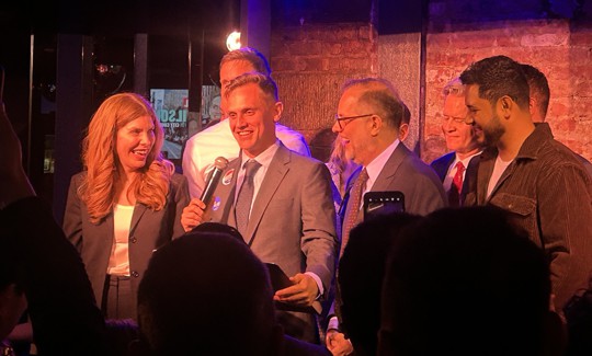 Carl Wilson declared victory on election night, surrounded by New York City Council Speaker Julie Menin, state Sen. Erik Bottcher, City Comptroller Mark Levine, Manhattan Borough President Brad Hoylman-Sigal and Council Members Justin Sanchez and Erik Dinowitz.