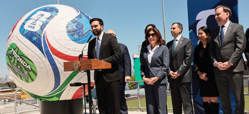 Mayor Zohran Mamdani speaks at a press conference next to a large replica of a World Cup soccer ball at Staten Island University Hospital Community Park on April 27, 2026.