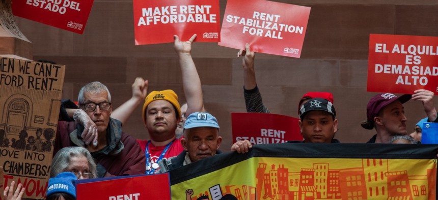 Advocates rally in the state Capitol on Wednesday for more rent assistance in the next state budget.