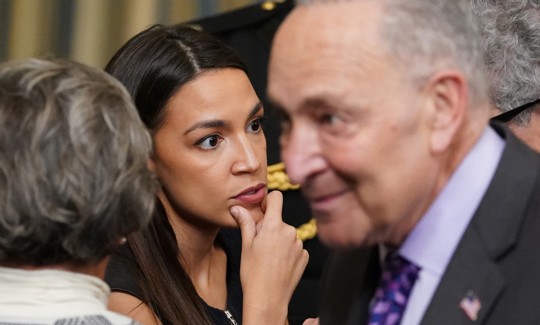 Rep. Alexandria Ocasio-Cortez, center, must decide whether to challenge Senate Minority Leader Chuck Schumer, right, in 2028.