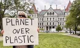 This climate advocate was one of dozens to rally in West Capitol Park on Monday in support of the bill to limit plastic packaging on products in the state.