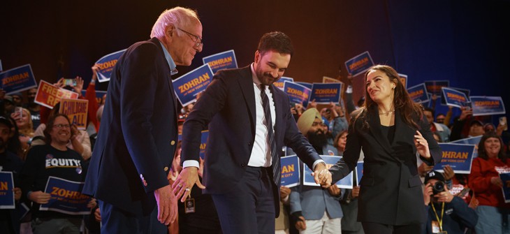 U.S. Sen. Bernie Sanders, Mayor Zohran Mamdani and Rep. Alexandria Ocasio-Cortez hold hands at a Mamdani campaign rally on Oct. 26, 2025.