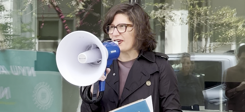 Anne Marie Brady speaks at a rally in April about the need for paid family leave for adjunct faculty at NYU.
