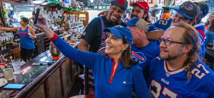 Gov. Kathy Hochul shows off her Western New York roots through her Bills fandom.