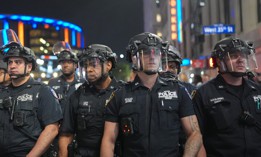 NYPD officers get ready for crowd control outside the Knicks NBA finals game.