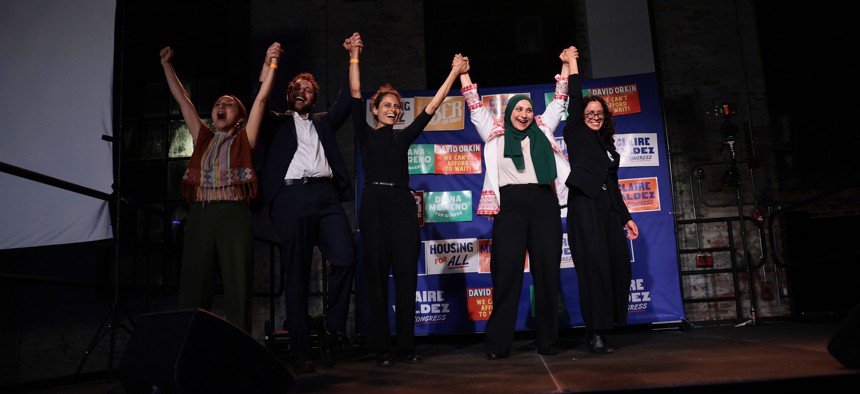 Winning DSA candidates Diana Moreno, David Orkin, Samantha Kattan, Aber Kawas and Claire Valdez celebrate at a DSA watch party at 99 Scott Studio in Brooklyn on June 23, 2026.
