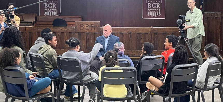New York City Council Member Harvey Epstein talks to students