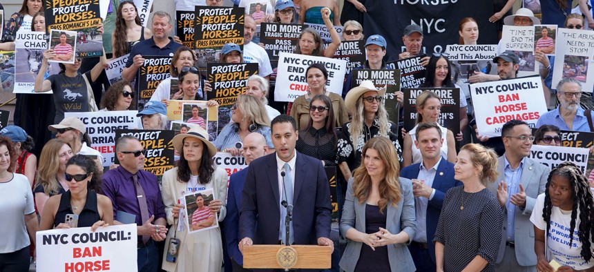 New York City Council Member Chris Marte rallies with Speaker Julie Menin and other supporters of his bill to ban horse-drawn carriages on Wednesday.