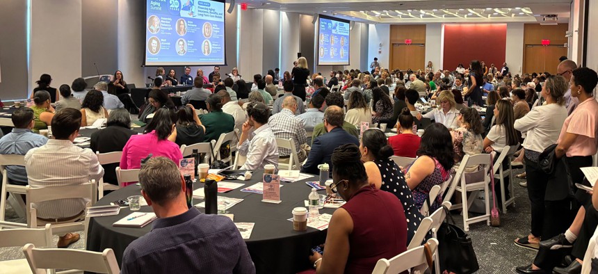 Aging industry professionals packed a room at Fordham Law in Manhattan Wednesday to connect with colleagues. 