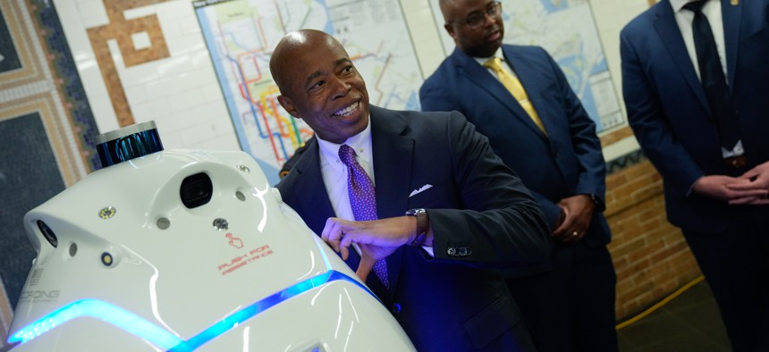 Former New York City Mayor Eric Adams hanging out with the K5 robot at the Times Square subway station in 2023.