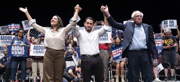 Rep. Alexandria Ocasio-Cortez, left, and U.S. Sen. Bernie Sanders, right, campaign with Abdul El-Sayed in Detroit on July 18, 2026.