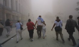Smoke hangs in the air in the aftermath of the 9/11 attacks.
