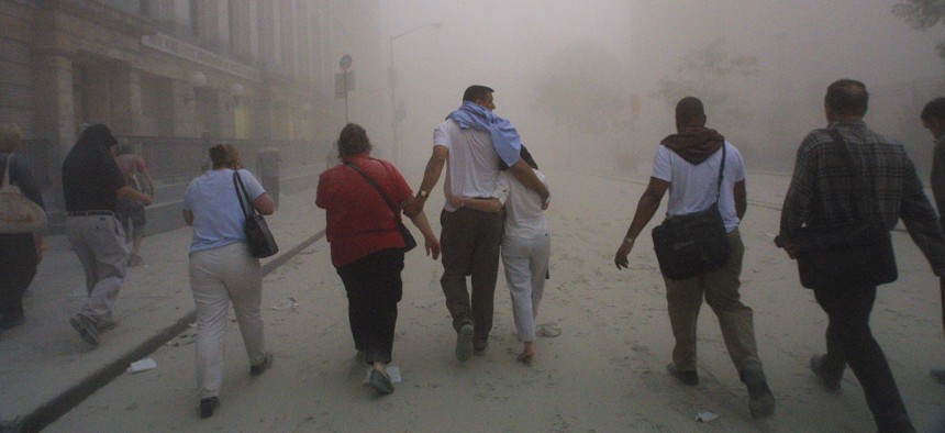 Smoke hangs in the air in the aftermath of the 9/11 attacks.