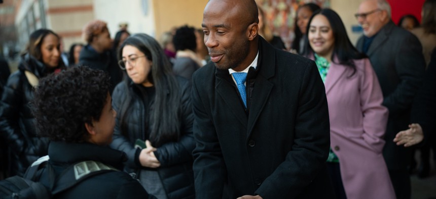 New York City schools Chancellor Kamar Samuels greets students in January 2026.