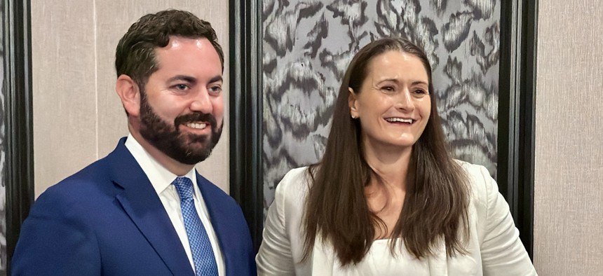 Rep. Mike Lawler and Democrat Cait Conley were not allowed to address each other during Wednesday’s Dutchess County Chamber of Commerce forum, but stood together for a photo afterward.