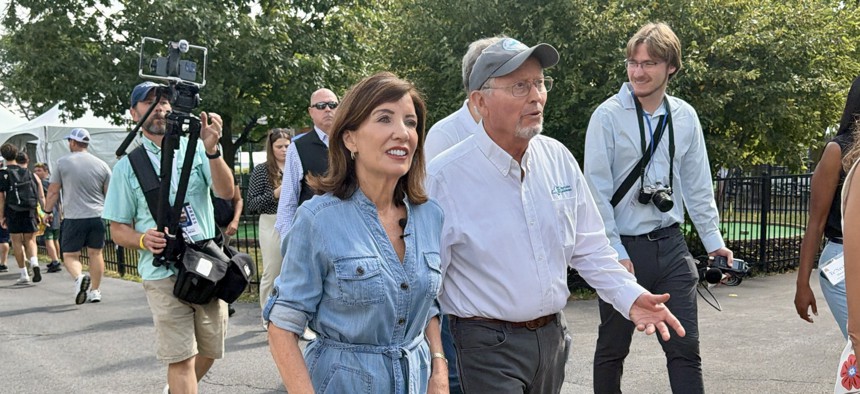 Gov. Kathy Hochul tours the Great New York State Fair with state Department of Agriculture and Markets Commissioner Richard Ball. 