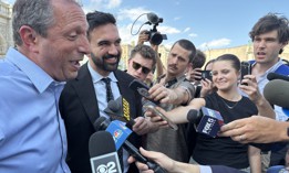 Reporters question New York City mayoral candidates Brad Lander and Zohran Mamdani in 2025.