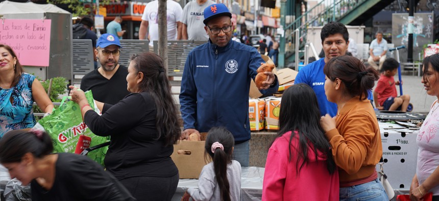 Queens Borough President Donovan Richards participates in an Immigrant Resource Fair and Food Giveaway in Corona Plaza on Aug. 24, 2023.