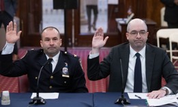 New York City Police Department Inspector William Haut and Deputy Commissioner of Legal Matters Michael Gerber testify at a City Council hearing on Wednesday.