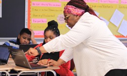 Students and a teacher at the Urban Assembly School of Applied Math and Science.