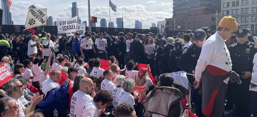 New York City police officers arrest dozens at pro-Palestintian protest outside United Nations, where Israeli Prime Minister is scheduled to make an address Thursday.