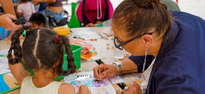 ACS Commissioner Rebecca Jones Gaston participates in annual National Coloring Book Day.