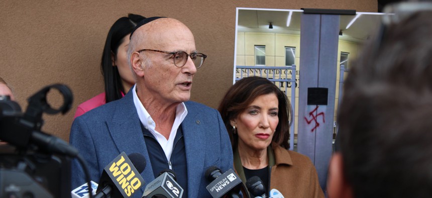 State Sen. Sam Sutton and Gov. Kathy Hochul speak at a press conference about antisemitism.